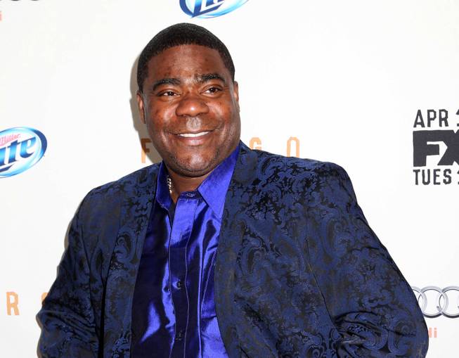 In this April 9, 2014, photo, actor Tracy Morgan attends the FX Networks Upfront premiere screening of "Fargo" at the SVA Theater in New York. Wal-Mart has denied claims by lawyers for actor-comedian Morgan that the company is stalling a federal lawsuit over a fatal highway crash in New Jersey last summer.