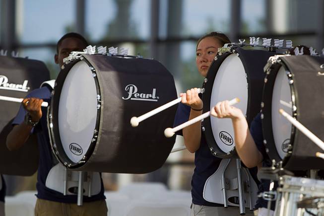 Members of the Centennial High School marching band perform during a ceremony honoring the Mountain Ridge Little League team at Las Vegas City Hall Saturday, Aug. 30, 2014. After the ceremony, the team boarded an open-air Big Bus for a police-escorted parade down the Las Vegas Strip.