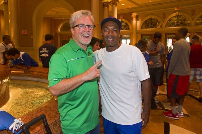 Boxing trainer Freddie Roach and former UNLV assistant boxing coach Frank Slaughter poses at the Venetian Las Vegas Resort in Las Vegas Nevada Aug. 30, 2014. Boxers Manny Pacquiao of the Philippines and Chris Algieri of Huntington, N.Y. are on day six of an international tour promoting their WBO welterweight title fight in Macau, China on November 22, 2014.