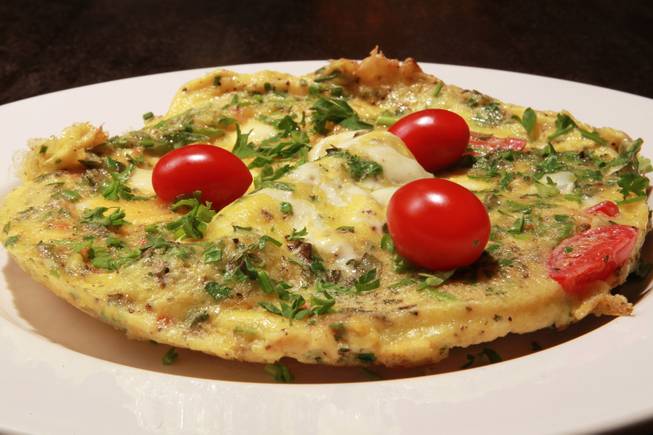 Omelette aux fines herbs prepared by Origin India on Friday, Aug. 29, 2014, in Las Vegas.