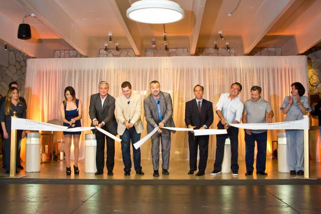 Chuck Bowling, president and COO, Mandalay Bay; Josh Fluhr, COO, Morgans Hotel Group; Matthew Chilton, general manager, Delano Las Vegas; Corey Sanders, COO, MGM Resorts International; and employees cut the ribbon to officially open Delano Las Vegas on Tuesday, Sept. 2, 2014.