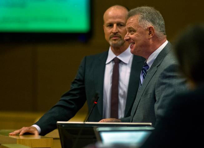 Dean House speaks while joined by Justin Findlay as they address the Las Vegas City Council during a presentation on the proposed downtown soccer stadium on Wednesday, September 3, 2014.