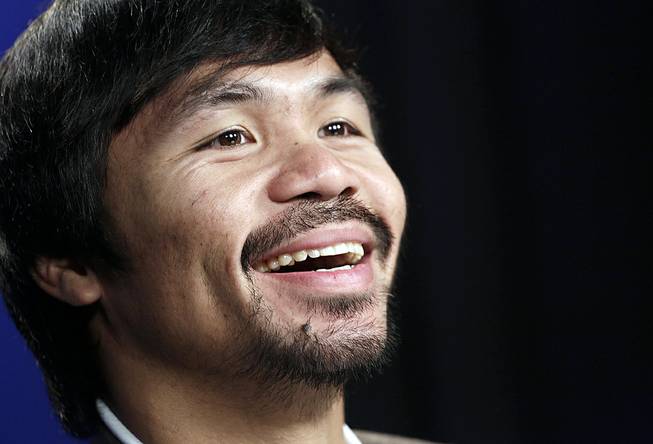 Boxer Manny Pacquiao participates in an interview with the Associated Press on Friday, Sept. 5, 2014, in New York. 