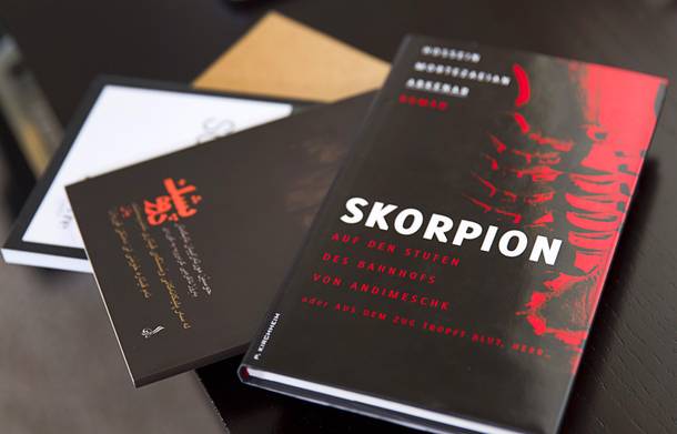 A Scorpion on the Steps of Andimeshk Railroad Station, a novel by Iranian writer Hossein M. Abkenar, is displayed at his home in Las Vegas. It has been translated into French, German and Kurdish. It is banned in Iran.