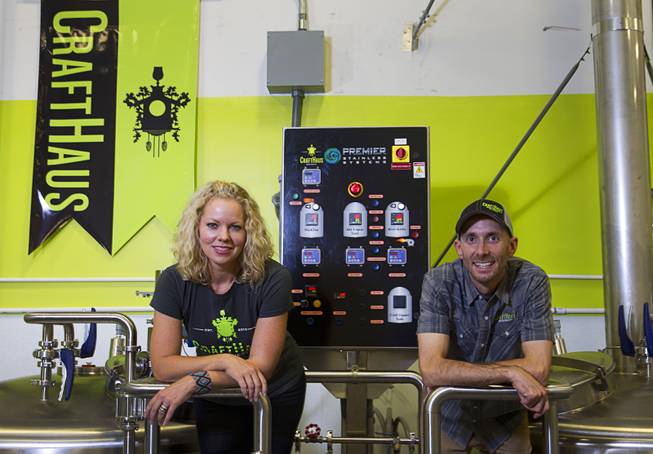 Founders Wyndee and Dave Forrest pose on the brew deck at the CraftHaus Brewery in the Henderson Booze District, 7350 Eastgate Rd., Monday, Sept. 8, 2014. The brewery celebrates it's grand opening Friday, Sept. 12.