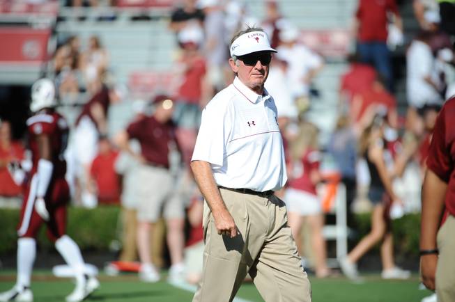South Carolina head coach Steve Spurrier looks on during warm ups before an NCAA college football game against Texas A&M on Thursday, Aug. 28, 2014, in Columbia, S.C. Texas A&M won 52-28.