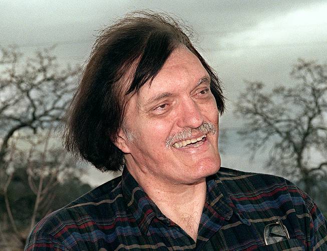 In this Jan. 18, 1999, photo, longtime resident and booster of Yosemite Lakes Park Richard Kiel talks about moving to the foothill community near Coarsegold, Calif., from Southern California for the benefit of his children. Kiel, the towering actor best known for portraying steel-toothed villain Jaws in a pair of James Bond films, has died. 