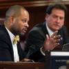 Sen. Aaron Ford, D-Las Vegas, left, questions economic experts on the Senate floor during the second day of a special session at the Nevada Legislature in Carson City on Thursday, Sept. 11, 2014. Ford opposes a plan to gut funds from the film tax credit program to help fund a complex deal to bring Tesla Motors to Nevada. Lt. Gov. Brian Krolicki is at right. 
