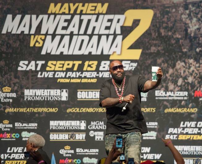 Rapper Rick Ross performs during the Floyd Mayweather Jr.-Marcos Maidana ...