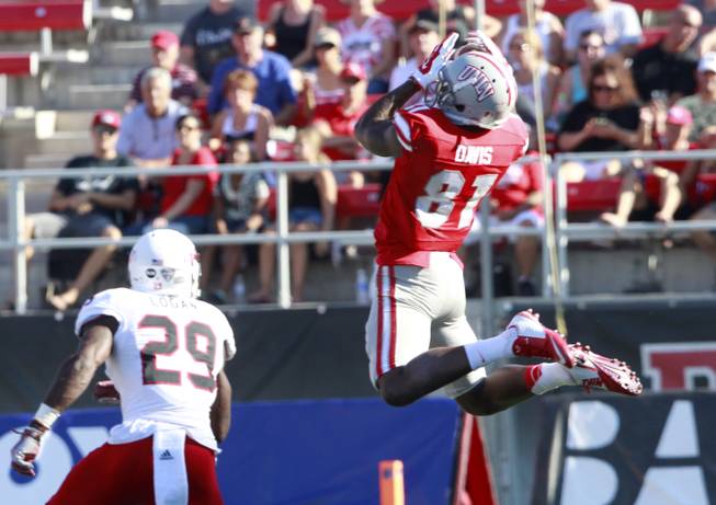 UNLV receiver Devante Davis caught six passes for 150 yards and two touchdowns in the Rebels' 48-34 loss to Northern Illinois at Sam Boyd Stadium on Saturday, Sept. 13, 2014.