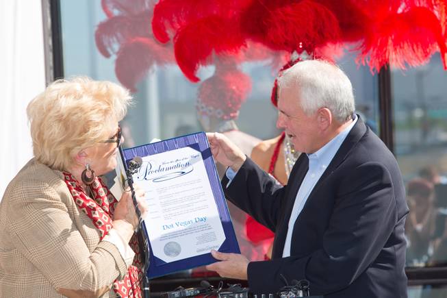 Las Vegas Mayor Carolyn Goodman congratulates Jim Trevino, CEO of Dot Vegas Inc., and presents him with a proclamation of "Dot Vegas" Day during a ceremonial launch at City Hall for the new .vegas top level domain, Tuesday Sept. 16, 2014.