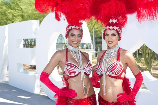 Las Vegas showgirls help welcome the new .vegas top level domain during a ceremonial launch at City Hall, Tuesday Sept. 16, 2014.