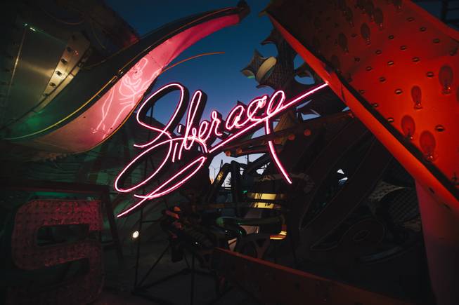 The newly restored Liberace sign amongst the collection  at The Neon Museum on Monday, Sept. 15, 2014 in Las Vegas, Nev.