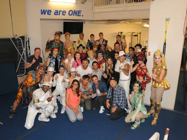 Liam Payne of One Direction, front center in the denim shirt and white sneakers, with the cast of Cirque du Soleil’s “Michael Jackson One” on Monday, Sept. 15, 2014, at Mandalay Bay.