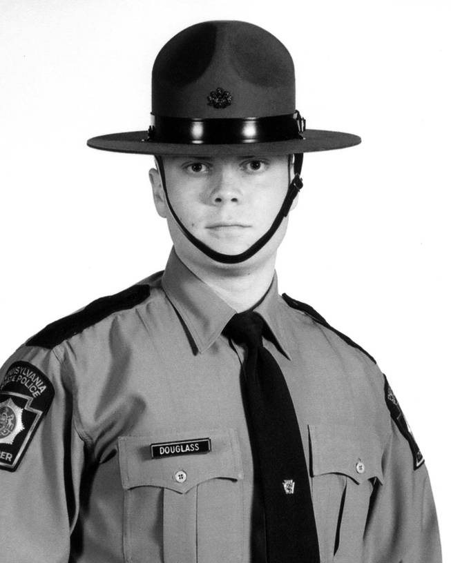 This photo provided by Pennsylvania State Police shows Trooper Alex Douglass.