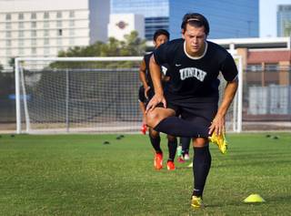UNLV soccer player Julien Dragomir warms up during practice at UNLV Thursday, Sept. 18, 2014.