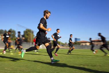 UNLV soccer player Connor Coletti runs drills with teammates during practice at UNLV Thursday, Sept. 18, 2014.