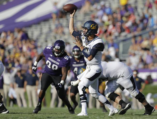 California quarterback Jared Goff (16) throws a pass during the second half of an NCAA college football game against Northwestern in Evanston, Ill., Saturday, Aug. 30, 2014. (AP Photo/Nam Y. Huh)
