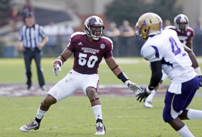 Mississippi State linebacker Benardrick McKinney (50) covers Alcorn State running back Anthony Williams III (4) in the first  quarter of their NCAA college football game at Davis Wade Stadium, in Starkville, Miss. Mississippi State won 51-7. (AP Photo/Rogelio V. Solis)