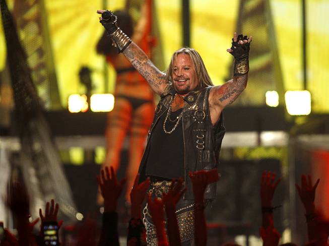 Motley Crue lead singer Vince Neil performs during the 2014 iHeartRadio Music Festival at MGM Grand Garden Arena on Friday, Sept. 19, 2014, in Las Vegas.