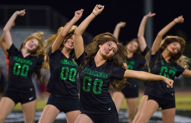 Palo Verde Primadonna dancers perform for the crowd at the end of the quarter during their game versus Las Vegas on Friday, September 19, 2014.