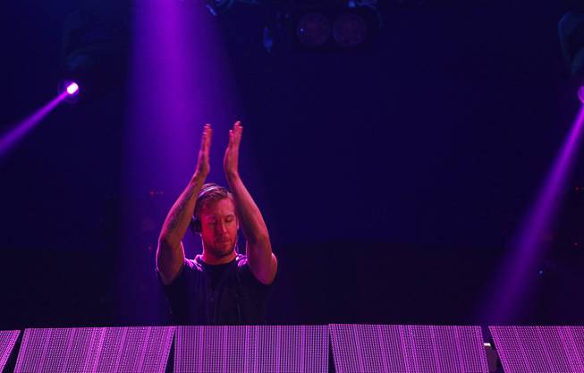 Scottish DJ Calvin Harris performs during Night 2 of the 2014 iHeartRadio Music Festival at MGM Grand Garden Arena on Saturday, Sept. 20, 2014, in Las Vegas.