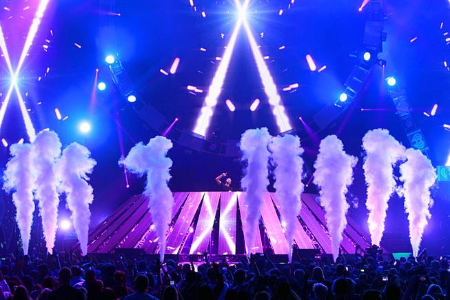 Scottish DJ Calvin Harris performs during Night 2 of the 2014 iHeartRadio Music Festival at MGM Grand Garden Arena on Saturday, Sept. 20, 2014, in Las Vegas.