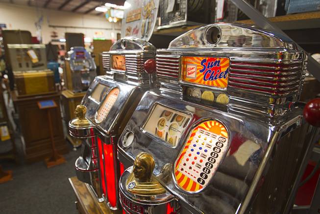 Quarter slot machines from the late 1940's and early 1950's are displayed during an auction at Victorian Casino Antiques, 4520 Arville St., Sunday Sept. 21, 2014. The William F. Harrah Antique Gambling Machine collection was the centerpiece of a three-day live auction event. The collection included more than 90 upright slot machines, trade stimulators, three-reelers and floor consoles hailing from the late 1800s to the mid-1900s.