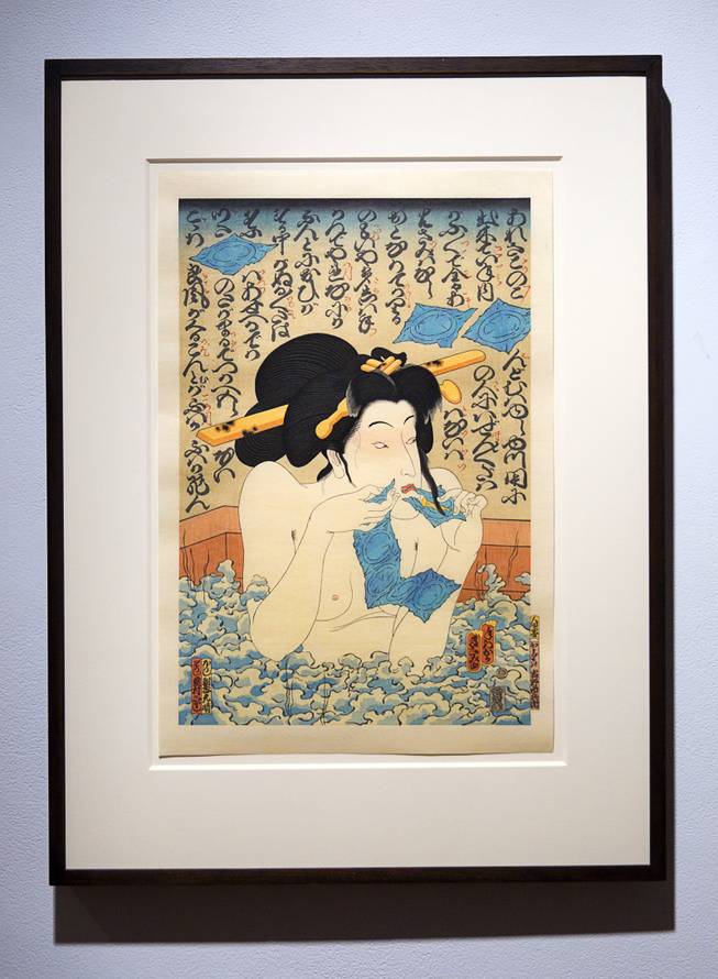 "AIDS Series/Geisha in Bath" by Masami Teraoka is displayed in the Ghost Dogs: Japanese-American Legends exhibit in the Donna Beam Fine Art Gallery at UNLV Monday, Sept. 22, 2014. The exhibit closes Saturday, Sept. 27.