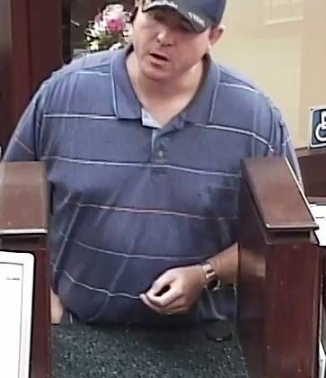 Metro Police released this photo of a suspect in the Sept. 15, 2014, robbery of a bank inside a grocery store near the intersection of Windmill Lane and Eastern Avenue.