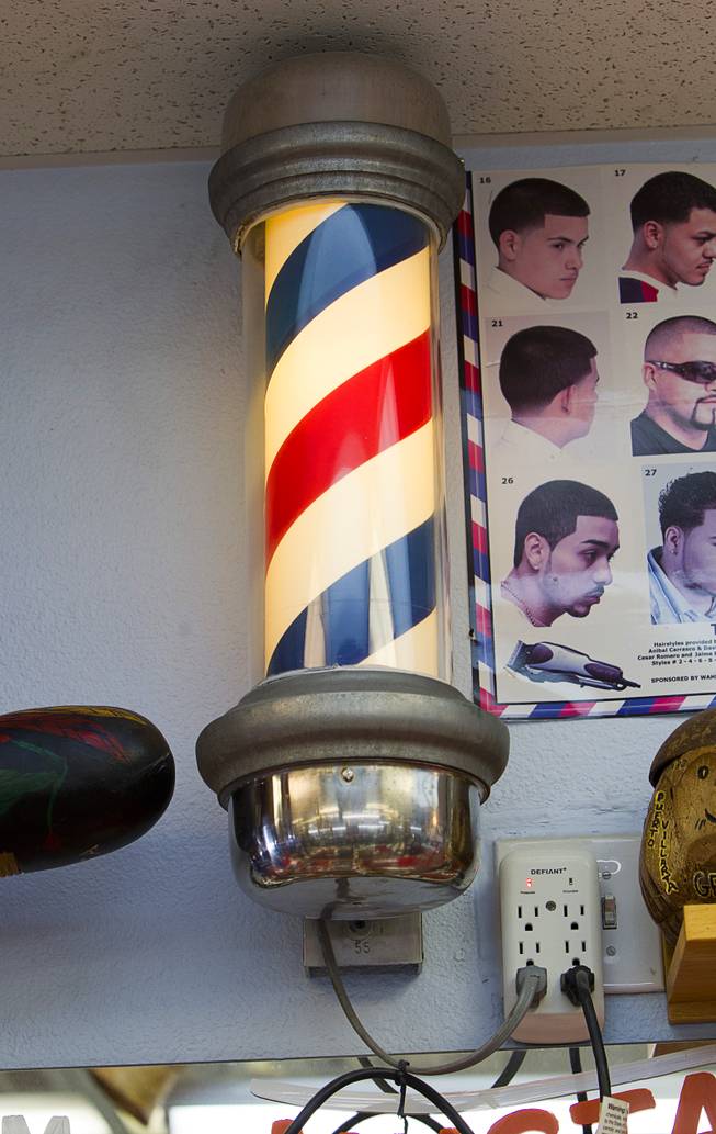 A barber pole is shown inside at Geraldo's Classic Barber Shop, 3869 Spring Mountain Rd., Sunday Sept. 21, 2014.