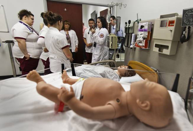 The accelerated bachelor of nursing program at Roseman University in Henderson uses a simulation lab with mannequins that emit lifelike noise and responses as the students work with "patients" on Thursday, September 18, 2014.   L.E. Baskow.