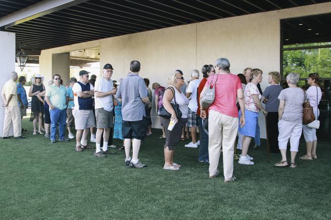 Locals line up to take a tour of Wayne Newton's former home during an open house on Monday, September 22, 2014.