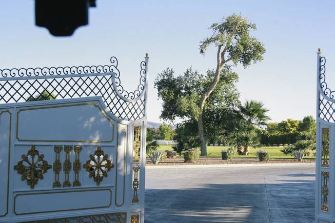 The entrance gate to Wayne Newton's former home, once known as Casa de Shenandoah, during an open house on Monday, September 22, 2014.