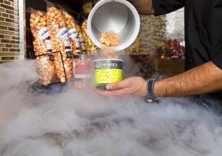 Owner Oliver Morowati makes frozen popcorns at Popped, a gourmet popcorn shop at 3700 S. Hualapai Way, Wednesday Sept. 24, 2014. The shop blasts popcorn with liquid nitrogen (-321F) to create a frozen popcorn dessert. STEVE MARCU
