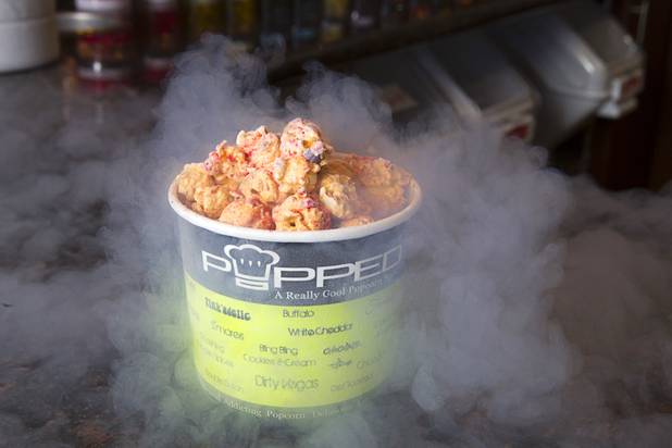 Fresh frozen popcorn is displayed at Popped, a gourmet popcorn shop at 3700 S. Hualapai Way, Wednesday Sept. 24, 2014. The shop blasts popcorn with liquid nitrogen (-321F) to create a frozen popcorn dessert.