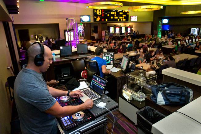 DJ Justin Sayne does his best to pump up the electronic bingo crowd at Green Valley Ranch on Tuesday, September 23, 2014. .