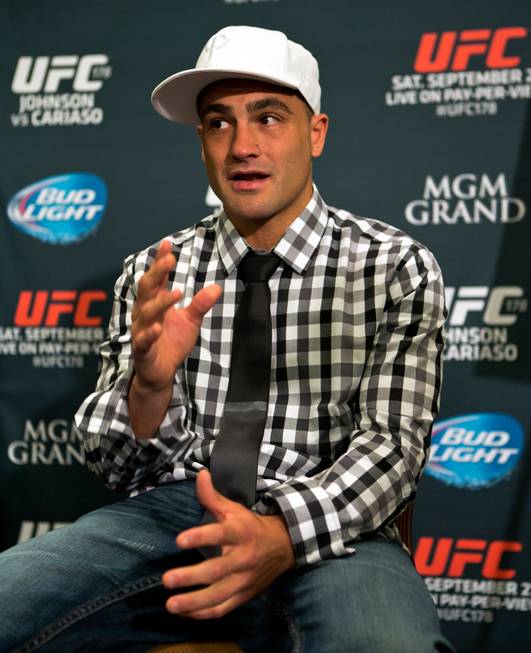 UFC 178 lightweight Eddie Alvarez replies to a reporter during ...