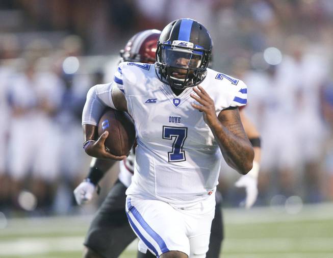 Duke quarterback Anthony Boone (7) runs the ball in the first half of an NCAA college football game at Veterans Memorial Stadium, Saturday, Sept. 6, 2014, in Troy, Ala. (AP Photo/ Hal Yeager)