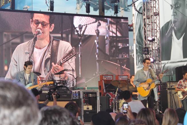 John Mayer performs a three-song set as part of the announcement Rock In Rio lineup announcement in Times Square on Friday, Sept. 26, 2014.