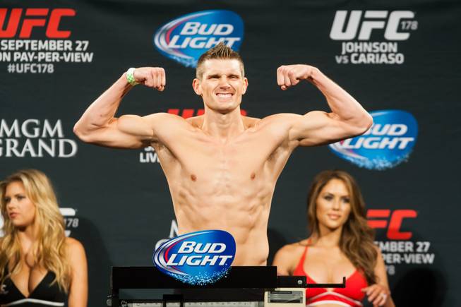 Stephen Thompson flexes after weighing in for UFC 178 Friday, September 26, 2014, at the MGM Grand's Convention Center.
