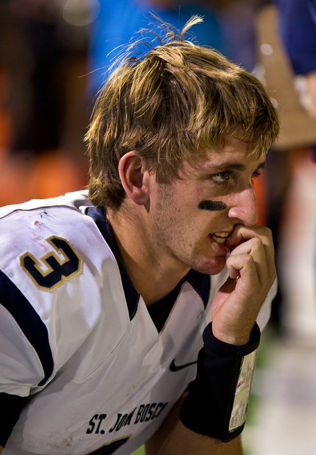 St. John Bosco QB Josh Rosen chews on his finger along the sidelines as Bishop Gorman takes control and chews up the clock late in their game on Friday, September 26, 2014.