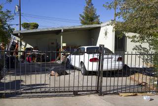 A home owned by a North Las Vegas City Councilman Isaac Barron is shown on Stanley Avenue in North Las Vegas Monday Sept. 29, 2014. A fire on Sunday injured one man and killed 45 dogs in the home.