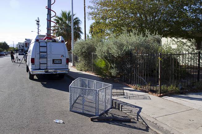 Animal fences are shown outside a home owned by a North Las Vegas City Councilman Isaac Barron is shown on Stanley Avenue in North Las Vegas Monday Sept. 29, 2014. A fire on Sunday injured one man and killed 45 dogs in the home.