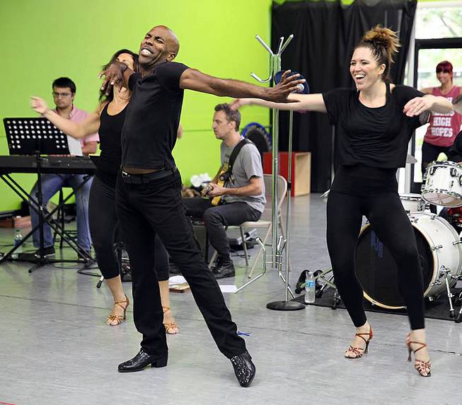 Eric Jordan Young, shown with backing dancer Sarah Short, right, rehearses with his show "Shakin'," at Dance Factory on West Sahara Avenue, on Wednesday, Sept. 24, 2014.