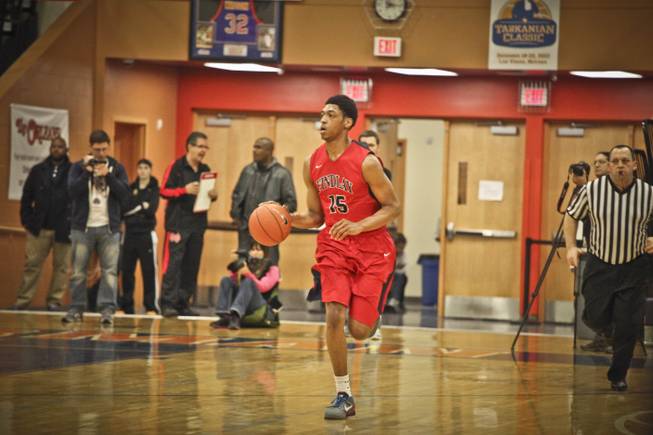 Findlay Prep forward Justin Jackson brings the ball up the court at Bishop Gorman High during the 2013-14 season. Jackson, a top-30 player in the class of 2016, committed to UNLV.