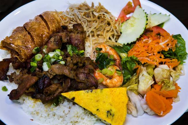 Nem Nuong Bistro features the No. 37 which has shrimp, pork egg loaf, shrimp paste in tofu skin with rice and other tasty things on Thursday, September 25, 2014. L.E. Baskow.