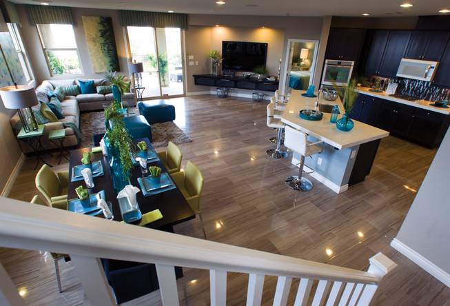 A great room (kitchen, living, dining) is shown in a two-story plan 2568 model home at KB Homes' Tevare residential development in Summerlin on Wednesday, July 30, 2014. 