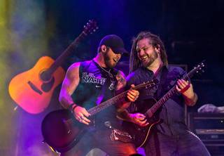 Brantley Gilbert performs with his guitar player during the Route 91 Harvest Festival at MGM Resorts Village on Friday, Oct. 3, 2014.