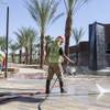 Workers prepare for the opening of Downtown Summerlin on Monday, Oct. 6, 2014, in Las Vegas. The 106-acre development is at Sahara Avenue and the 215 Beltway.